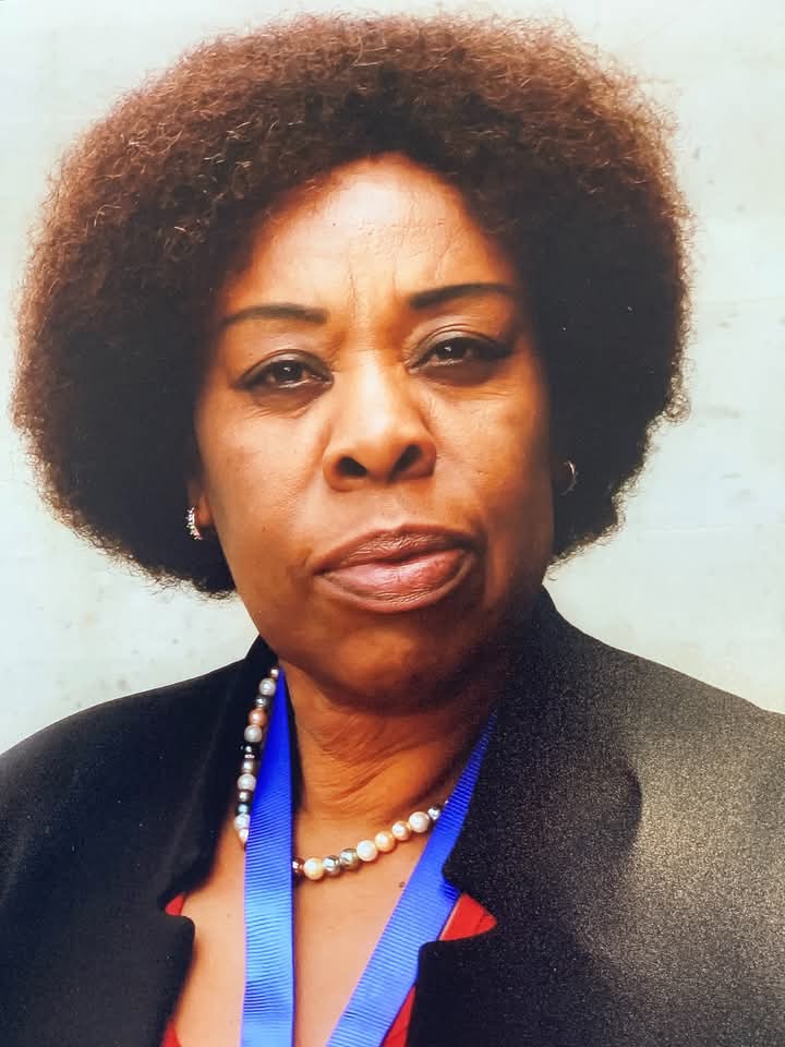 Dr . Esther Kimani